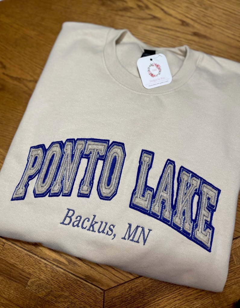 Image of felt applique sweatshirt