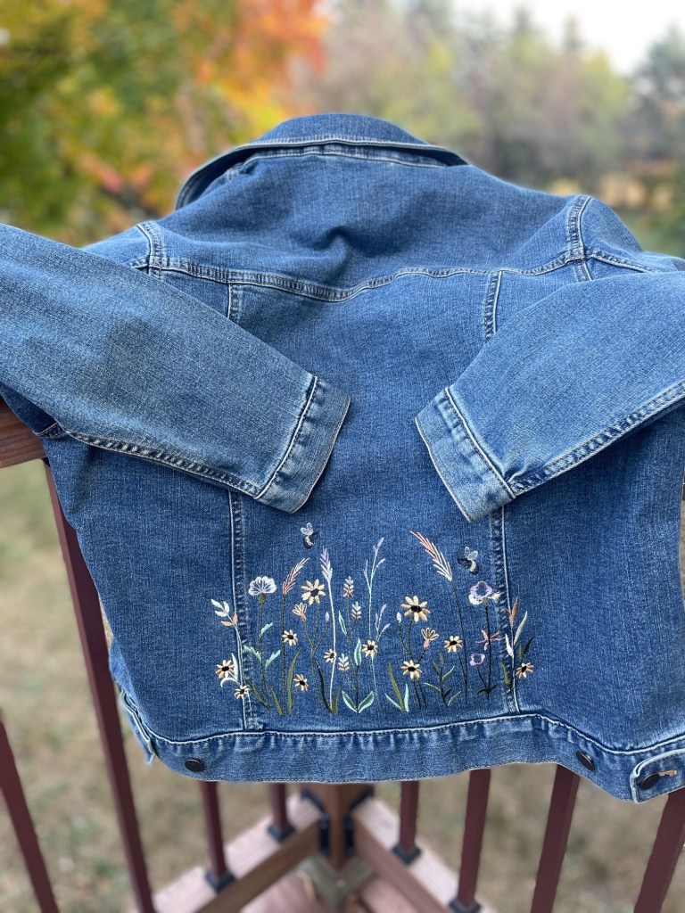 Image of embroidered denim jacket
